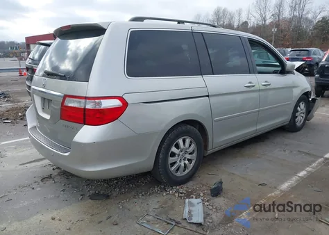 2005 Honda Odyssey Touring z USA, uszkodzony, nr VIN 5FNRL388X5B131696
